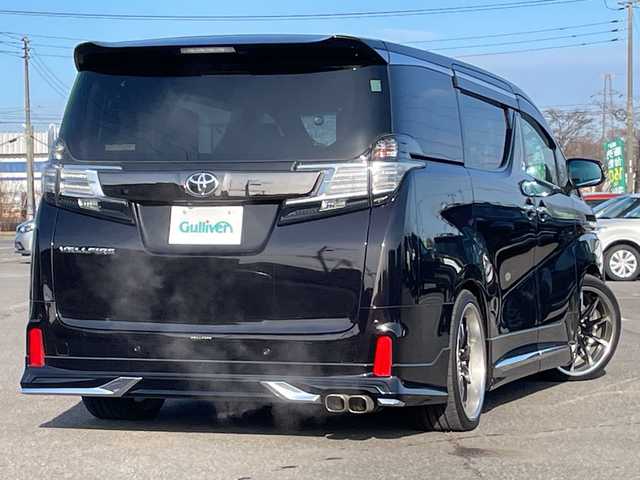 トヨタ ヴェルファイア 2.5Z Aエディデョン ゴールデンアイズ 道央・札幌 2017(平29)年 3万km バーニングブラッククリスタルシャインガラスフレーク ４WD/モデリスタエアロ/社外足廻り（ダウンサス）/純正ディーラーOPナビ/CD/DVD/BT/フルセグ/純正フリップダウンモニター/横滑り防止装置/クルーズコントロール/パーキングアシスト/クリアランスソナー/バック/フロントカメラ/ビルトインETC/ドライブレコーダー/アイドリングストップ/ECOMODE/nanoe/両側パワースライドドア/パワーバックドア/N席/２列目オットマン/ハーフレザーシート/革巻きウッドコンビステアリング/ステアリングリモコン/AC100V/電動パーキング/ブレーキホールド/MTモード付AT/プッシュスタート/スマートキー/LEDヘッドライト/オートライト/フォグランプ/電動格納ミラー/ウィンカーミラー/純正フロアマット/ドアバイザー/サスペンション/グリル積込