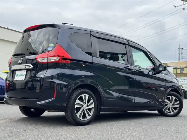 ホンダ フリード G ホンダセンシング 千葉県 2019(令1)年 5.2万km ミッドナイトブルービームM ワンオーナー車/禁煙車/ホンダセンシング/レーダークルーズコントロール/レーンキープアシスト/リアコーナーセンサー/社外SDナビ/フルセグTV/Bluetooth/バックカメラ/両側電動スライドドア/ドライブレコーダー/LEDライト/ETC/スマートキー