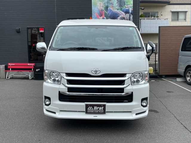 トヨタ ハイエース GL 福島県 2015(平27)年 1.4万km ホワイトパールクリスタルシャイン 純正ナビ/純正フロアマット/モデリスタフロントエアロ・グリル/純正ドアバイザー/バックカメラ/コムテック【レーダー探知機】/ETC/スマートキー/片側電動スライドドア/純正鉄ホイール＋夏タイヤ積込み有【4本】