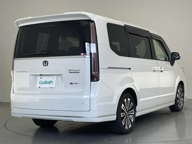 ホンダ ステップワゴン スパーダ eHEV プレミアムライン 愛知県 2023(令5)年 1.4万km プラチナホワイトパール 純正11.4インチナビ/フルセグ/DVD/CD/USB/アラウンドビューモニター/ホンダセンシング/ハーフレザーシート/ブラインドスポットモニター/両側パワースライドドア/電動リアゲート/オットマンチェア/シートヒーターD+N/純正前後ドライブレコーダー/ETC/LEDヘッドライト/スマートキー×2