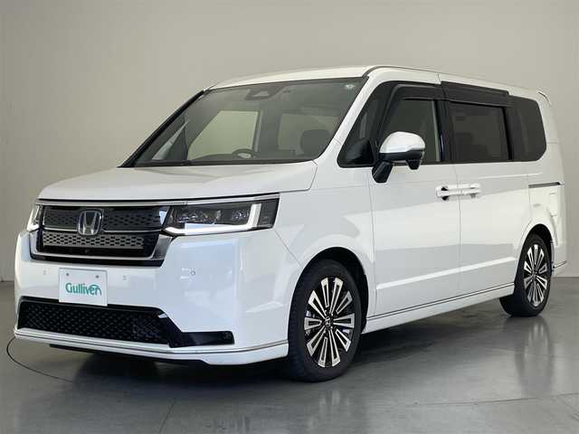 ホンダ ステップワゴン スパーダ eHEV プレミアムライン 愛知県 2023(令5)年 1.4万km プラチナホワイトパール 純正11.4インチナビ/フルセグ/DVD/CD/USB/アラウンドビューモニター/ホンダセンシング/ハーフレザーシート/ブラインドスポットモニター/両側パワースライドドア/電動リアゲート/オットマンチェア/シートヒーターD+N/純正前後ドライブレコーダー/ETC/LEDヘッドライト/スマートキー×2