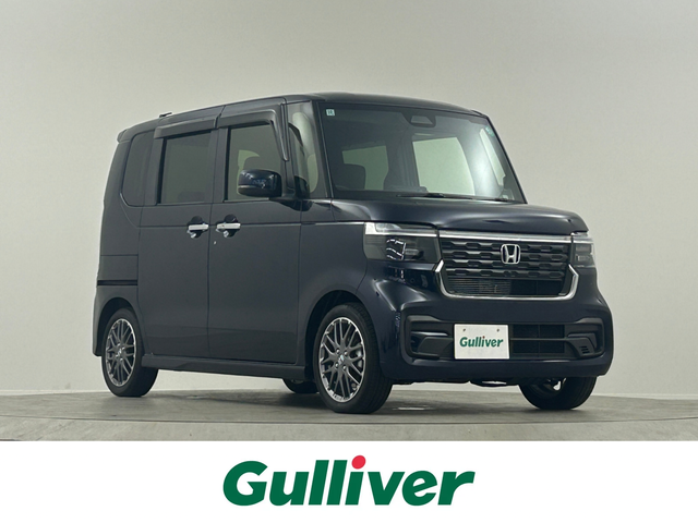 ホンダ Ｎ ＢＯＸ カスタム ターボ 埼玉県 2024(令6)年 0.3万km ミッドナイトブルービームM 純正９型ナビ　１２．８型後席モニター　両側パワースライドドア Bluetooth バックカメラ ハーフレザーシート レーダークルーズコントロール オートマチックハイビーム シートヒーター