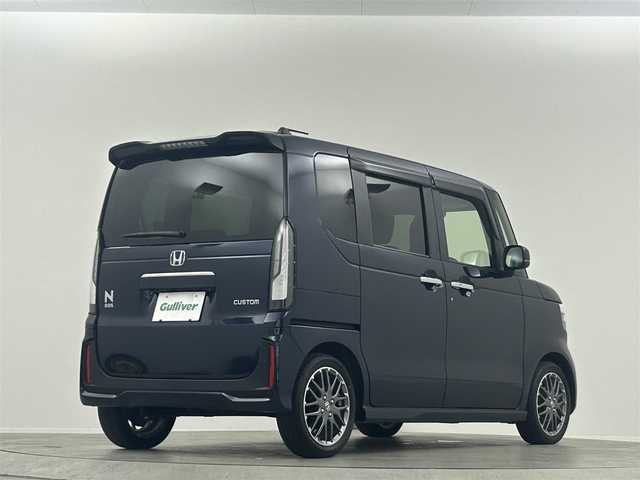 ホンダ Ｎ ＢＯＸ カスタム ターボ 埼玉県 2024(令6)年 0.3万km ミッドナイトブルービームM 純正９型ナビ　１２．８型後席モニター　両側パワースライドドア Bluetooth バックカメラ ハーフレザーシート レーダークルーズコントロール オートマチックハイビーム シートヒーター