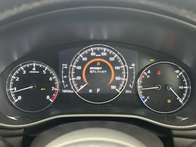 マツダ マツダ３ファストバック 15S ブラックトーンED 熊本県 2023(令5)年 1.9万km スノーフレイクホワイトパールマイカ 純正ナビ（ＣＤ・ＤＶＤ・フルセグ・ＢＴ・ＳＤ・ＵＳＢ）/全周囲カメラ　/ＥＴＣ　/前後クリアランスソナー　/レーダークルーズコントロール　/横滑り防止/アイドリングストップ/オートライト　/ＬＥＤヘッドライト　/社外フロアマット　/保証書　/取扱説明書