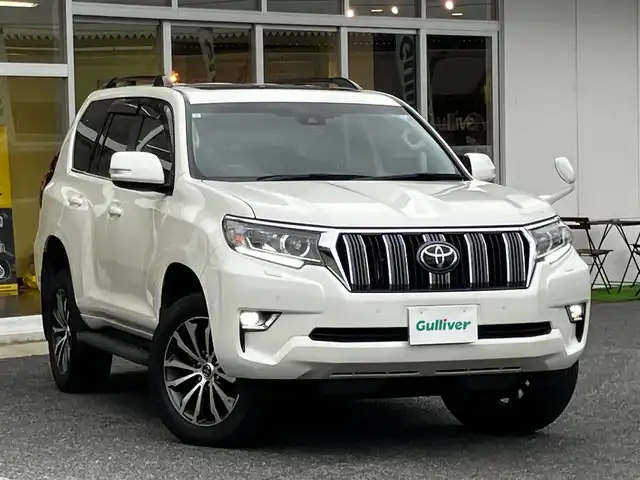 トヨタ ランドクルーザー プラド TX Lパッケージ 山口県 2021(令3)年 3.9万km ホワイトパールクリスタルシャイン 純正ナビ＆フルセグTV＆バックカメラ/黒レザーシート/フロントパワーシート/シートヒーター＆エアシート/サンルーフ/ルーフレール/純正19インチアルミホイール/レーダークルーズコントロール/LEDオートライト＆オートハイビーム/LED純正フォグ/純正フロアマット/ドアバイザー/プリクラッシュセーフティ/レーンキープアシスト/ウッドコンビステアリング