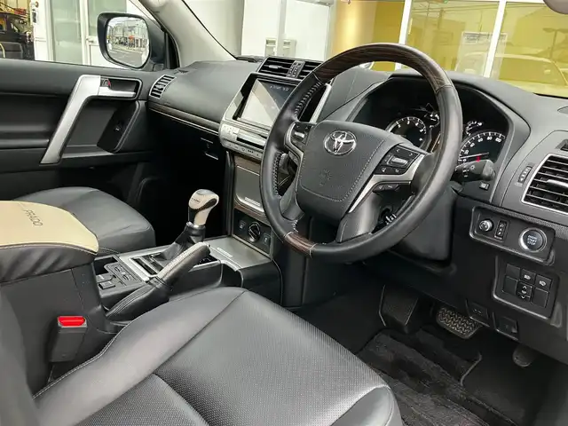 トヨタ ランドクルーザー プラド TX Lパッケージ 山口県 2021(令3)年 3.9万km ホワイトパールクリスタルシャイン 純正ナビ＆フルセグTV＆バックカメラ/黒レザーシート/フロントパワーシート/シートヒーター＆エアシート/サンルーフ/ルーフレール/純正19インチアルミホイール/レーダークルーズコントロール/LEDオートライト＆オートハイビーム/LED純正フォグ/純正フロアマット/ドアバイザー/プリクラッシュセーフティ/レーンキープアシスト/ウッドコンビステアリング