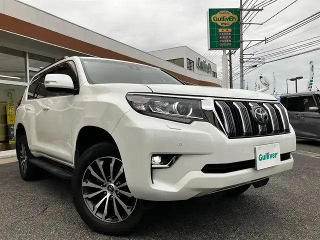 トヨタ ランドクルーザー プラド TX Lパッケージ 山口県 2021(令3)年 3.9万km ホワイトパールクリスタルシャイン 純正ナビ＆フルセグTV＆バックカメラ/黒レザーシート/フロントパワーシート/シートヒーター＆エアシート/サンルーフ/ルーフレール/純正19インチアルミホイール/レーダークルーズコントロール/LEDオートライト＆オートハイビーム/LED純正フォグ/純正フロアマット/ドアバイザー/プリクラッシュセーフティ/レーンキープアシスト/ウッドコンビステアリング