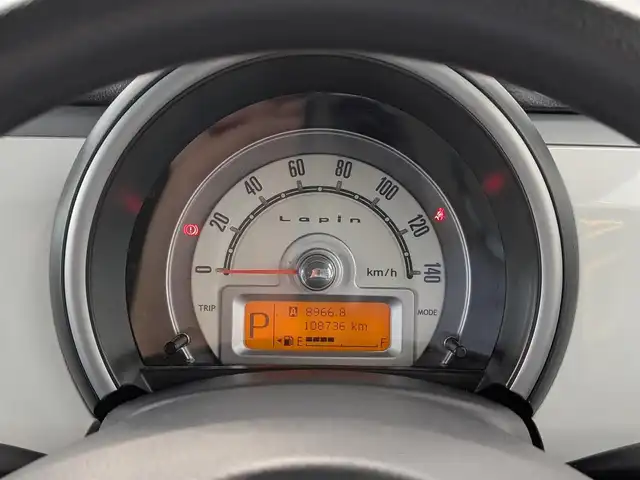 スズキ ラパン リミテッド 福井県 2010(平22)年 10.9万km ブルーイッシュブラックパール3 ETC/運転席シートヒーター/ソニーパーソナルナビ/純正カーオーディオ/純正ホイルキャップ/盗難防止装置/純正フロアマット/スマートキー/ダブルエアバッグ/保証書・取説