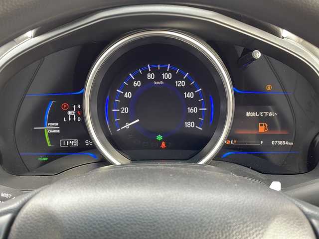 ホンダ フィット ハイブリット Fパッケージ 福島県 2016(平28)年 7.4万km クリスタルブラックパール 純正ナビ　バックＣ　ＢＴ　ワンセグＴＶ　ワイパーデザイアー　ＥＴＣ　ステリモ　ハロゲンヘッドライト　電格ミラー　スペアキー　前方ドラレコ　ＥＣＯＮ　純正ドアバイザー　純正ホイールキャップ　取扱説明書