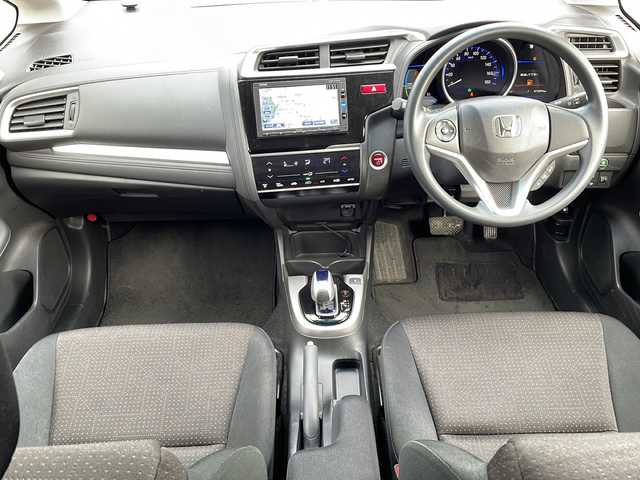 ホンダ フィット ハイブリット Fパッケージ 福島県 2016(平28)年 7.4万km クリスタルブラックパール 純正ナビ　バックＣ　ＢＴ　ワンセグＴＶ　ワイパーデザイアー　ＥＴＣ　ステリモ　ハロゲンヘッドライト　電格ミラー　スペアキー　前方ドラレコ　ＥＣＯＮ　純正ドアバイザー　純正ホイールキャップ　取扱説明書