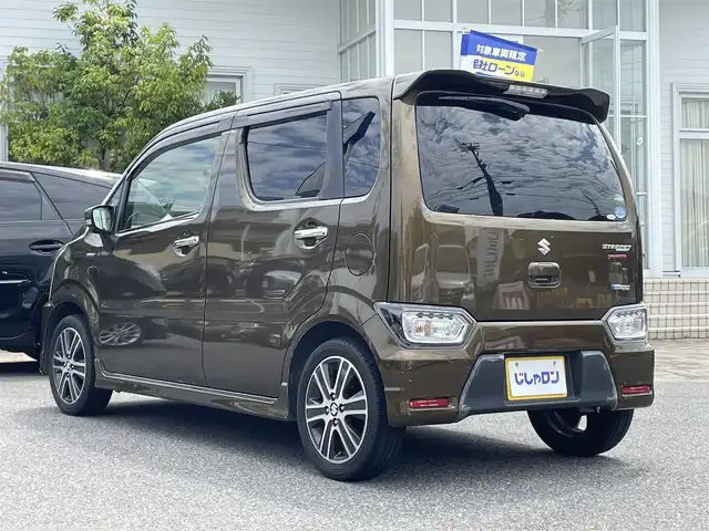 スズキ ワゴンＲ スティングレー HYBRID T 愛知県 2017(平29)年 8.9万km ブレイブカーキP (株)IDOMが運営する【じしゃロン名古屋鳴海店】の自社ローン専用車両になりますこちらは現金またはオートローンご利用時の価格です。自社ローンご希望の方は別途その旨お申付け下さい/全方位カメラ、バックカメラ/純正ナビ/衝突軽減システム/レーンキープアシスト/クルーズコントロール/スマートキー/フルセグテレビ/ETC/シートヒーター/オートライト/純正フロアマット/アイドリングストップ/パドルシフト