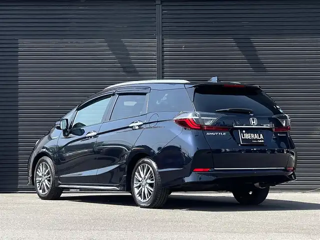 ホンダ シャトル ハイブリッド Z ホンダセンシング 山梨県 2020(令2)年 1万km ミッドナイトブルービームM 禁煙車/ワンオーナー/純正9インチナビ（VXM-207VFEi）/（CD/DVD/SD/BT/フルセグTV）/バックカメラ/ホンダセンシング/アダプティブクルーズコントロール/オートハイビーム/LEDヘッドライト/オートライト/フォグランプ/プッシュスタート/スマートキー/ルーフレール/ETC/ドアバイザー/フロアマット/新車時保証書/取扱説明書/全ディーラー記録簿（R3/6、R4/6、R5/5、R6/5）/スペアキー/鉄ホイール付きスタッドレスタイヤ4本車載