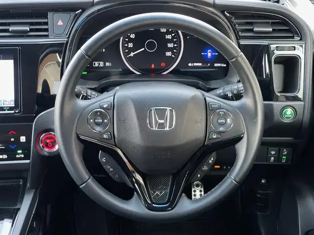 ホンダ シャトル ハイブリッド Z ホンダセンシング 山梨県 2020(令2)年 1万km ミッドナイトブルービームM 禁煙車/ワンオーナー/純正9インチナビ（VXM-207VFEi）/（CD/DVD/SD/BT/フルセグTV）/バックカメラ/ホンダセンシング/アダプティブクルーズコントロール/オートハイビーム/LEDヘッドライト/オートライト/フォグランプ/プッシュスタート/スマートキー/ルーフレール/ETC/ドアバイザー/フロアマット/新車時保証書/取扱説明書/全ディーラー記録簿（R3/6、R4/6、R5/5、R6/5）/スペアキー/鉄ホイール付きスタッドレスタイヤ4本車載