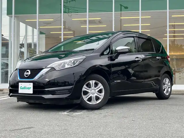 日産 ノート 静岡県 2017(平29)年 5万km スーパーブラック エンジンスタートボタン/パワーステアリング/パワーウィンドウ/保証書/取扱説明書/記録簿/アイドリングストップ/スマートキー（スペアキー１本）/AAC/純正SDナビ（BT接続、ワンセグTV、CDチェンジャー）/純正ETC/前後ドライブレコーダー/純正フロアマット/布系シート/ABS/横滑り防止装置/前後コーナーセンサー/レーンキープアシスト/キセノンヘッドライト/オートライト/Wエアバック/衝突軽減システム