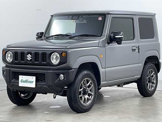 スズキ ジムニー XC 道央・札幌 2023(令5)年 0.3万km ミディアムグレー ・４ＷＤ/・寒冷地仕様/・社外９インチナビＴＶ＆ＢＴ＆ＤＶＤ＆ＣＤ＆ＵＳＢ＆ＨＤＭＩ/・バックカメラ/・スズキセーフティサポート/・ワンオーナー/・寒冷地仕様/・アイドリングストップ/・ダウンヒルアシスト/・クルーズコントロール/・横滑り防止機能/・２ＷＤ／４ＷＤ切り替え機能/・オートマチックハイビーム/・オートライト/・ＬＥＤヘッドライト/・フォグランプ/・社外ドライブレコーダー/・純正ＥＴＣ/・ドアミラーヒーター/・ミラーウィンカー