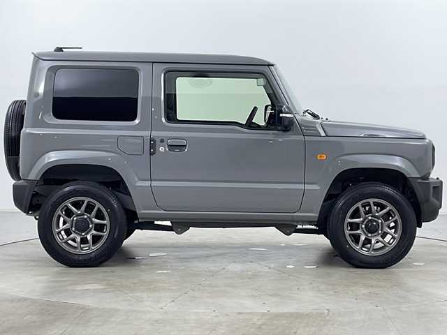 スズキ ジムニー XC 道央・札幌 2023(令5)年 0.3万km ミディアムグレー ・４ＷＤ/・寒冷地仕様/・社外９インチナビＴＶ＆ＢＴ＆ＤＶＤ＆ＣＤ＆ＵＳＢ＆ＨＤＭＩ/・バックカメラ/・スズキセーフティサポート/・ワンオーナー/・寒冷地仕様/・アイドリングストップ/・ダウンヒルアシスト/・クルーズコントロール/・横滑り防止機能/・２ＷＤ／４ＷＤ切り替え機能/・オートマチックハイビーム/・オートライト/・ＬＥＤヘッドライト/・フォグランプ/・社外ドライブレコーダー/・純正ＥＴＣ/・ドアミラーヒーター/・ミラーウィンカー