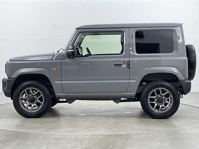 スズキ ジムニー XC 道央・札幌 2023(令5)年 0.3万km ミディアムグレー ・４ＷＤ/・寒冷地仕様/・社外９インチナビＴＶ＆ＢＴ＆ＤＶＤ＆ＣＤ＆ＵＳＢ＆ＨＤＭＩ/・バックカメラ/・スズキセーフティサポート/・ワンオーナー/・寒冷地仕様/・アイドリングストップ/・ダウンヒルアシスト/・クルーズコントロール/・横滑り防止機能/・２ＷＤ／４ＷＤ切り替え機能/・オートマチックハイビーム/・オートライト/・ＬＥＤヘッドライト/・フォグランプ/・社外ドライブレコーダー/・純正ＥＴＣ/・ドアミラーヒーター/・ミラーウィンカー