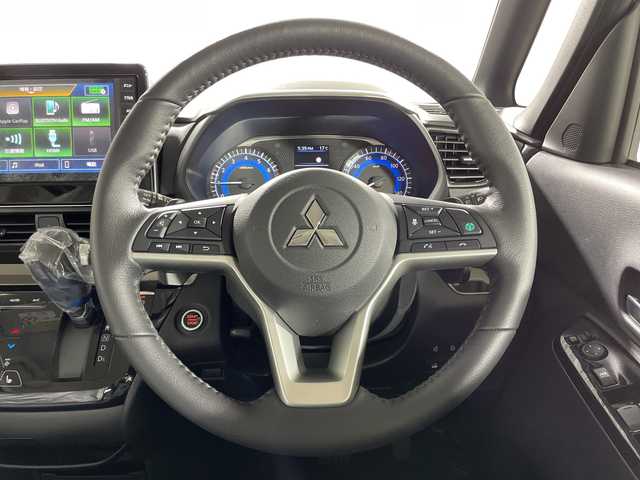 三菱 デリカミニ T プレミアム 神奈川県 2025(令7)年 0.1千km アメジストブラック/シルキーホワイト ターボ/2トーンカラー/ルーフレール/純正9型ディスプレイオーディオ/Androidauto　AppleCarPlay　Bluetooth　AM FM　USB　iPod　HDMI　VTR/マルチアラウンドビューモニター/ハンズフリー両側電動スライドドア【サンシェード】/デジタルインナーミラー/e-Assist/マイパイロット/衝突被害軽減ブレーキシステム/前方衝突予測警報/踏み間違い衝突防止アシスト/標識検知システム/車線逸脱警報システム/車線逸脱防止支援機能/先行車発進通知/オートマチックハイビーム/ふらつき警報/前後ソナー/アダブティブクルーズコントロール/レーンキープアシスト/革巻きステアリング/パドルシフト/ステアリングヒーター/合皮/ファブリック撥水シート/前席シートヒーター/ダウンヒルアシストコントロール/プラズマクラスター付リアサーキュレーター/電動パーキングブレーキ/ブレーキオートホールド/プッシュスタート/スマートキー/LEDヘッドランプ/オートライト/LEDフロントフォグランプ/純正15インチアルミホイール/純正リアスポイラー