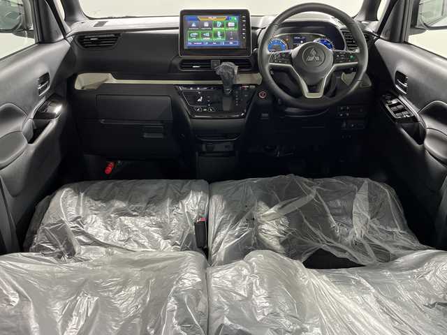 三菱 デリカミニ T プレミアム 神奈川県 2025(令7)年 0.1千km アメジストブラック/シルキーホワイト ターボ/2トーンカラー/ルーフレール/純正9型ディスプレイオーディオ/Androidauto　AppleCarPlay　Bluetooth　AM FM　USB　iPod　HDMI　VTR/マルチアラウンドビューモニター/ハンズフリー両側電動スライドドア【サンシェード】/デジタルインナーミラー/e-Assist/マイパイロット/衝突被害軽減ブレーキシステム/前方衝突予測警報/踏み間違い衝突防止アシスト/標識検知システム/車線逸脱警報システム/車線逸脱防止支援機能/先行車発進通知/オートマチックハイビーム/ふらつき警報/前後ソナー/アダブティブクルーズコントロール/レーンキープアシスト/革巻きステアリング/パドルシフト/ステアリングヒーター/合皮/ファブリック撥水シート/前席シートヒーター/ダウンヒルアシストコントロール/プラズマクラスター付リアサーキュレーター/電動パーキングブレーキ/ブレーキオートホールド/プッシュスタート/スマートキー/LEDヘッドランプ/オートライト/LEDフロントフォグランプ/純正15インチアルミホイール/純正リアスポイラー