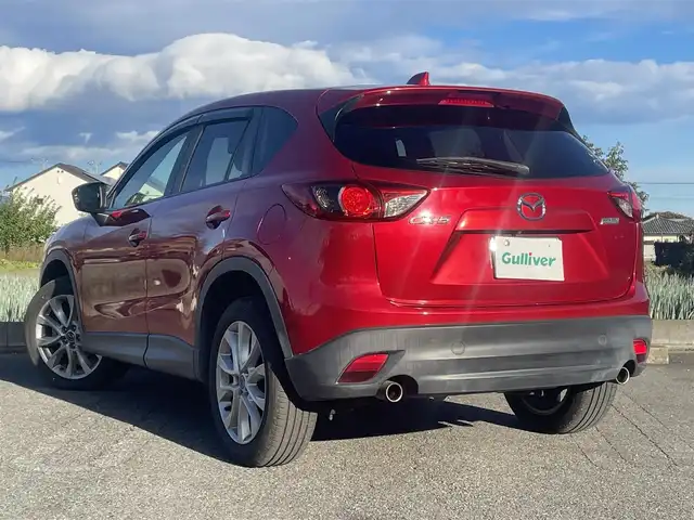 マツダ ＣＸ－５ 25S Lパッケージ 群馬県 2014(平26)年 12.9万km ソウルレッドプレミアムメタリック ワンオーナー/４WD/純正メモリナビ、地デジ、Bluetooth、CD/DVD/　（CA9K2）/バックカメラ/革巻きステア/クルーズコントロール/ETC/LEDヘッドライト/黒レザーシート/運転席パワーシート/前席シートヒーター/ドアバイザー/スマートキー×２/保証書、取説