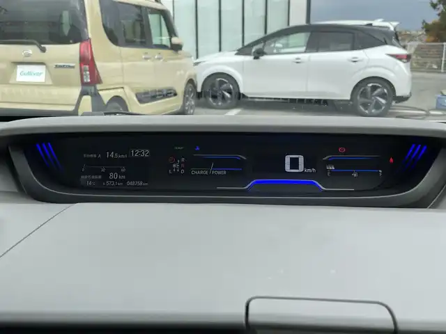 ホンダ フリード ハイブリット G ホンダセンシング 大阪府 2021(令3)年 4.9万km プラチナホワイトパール ホンダセンシング/ワンオーナー/純正9インチナビ/・フルセグTV/BT/USB/バックカメラ/11.6インチフリップダウンモニター/両側パワースライドドア/追従型クルーズコントロール/前ドライブレコーダー/ETC/純正フロアマット/ハーフレザーシート/革巻ハンドル/後席ロールサンシェード/純正15インチAW/取説・保証書/スペアキー/LEDヘッド