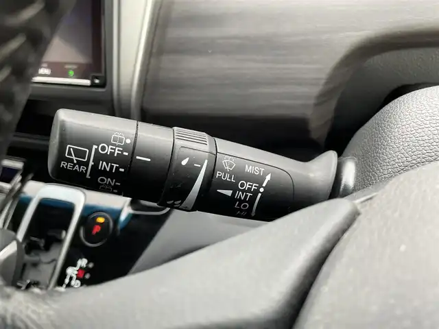 ホンダ フリード ハイブリット G ホンダセンシング 大阪府 2021(令3)年 4.9万km プラチナホワイトパール ホンダセンシング/ワンオーナー/純正9インチナビ/・フルセグTV/BT/USB/バックカメラ/11.6インチフリップダウンモニター/両側パワースライドドア/追従型クルーズコントロール/前ドライブレコーダー/ETC/純正フロアマット/ハーフレザーシート/革巻ハンドル/後席ロールサンシェード/純正15インチAW/取説・保証書/スペアキー/LEDヘッド