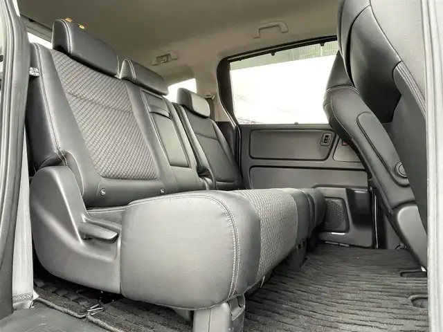 ホンダ フリード ハイブリット G ホンダセンシング 大阪府 2021(令3)年 4.9万km プラチナホワイトパール ホンダセンシング/ワンオーナー/純正9インチナビ/・フルセグTV/BT/USB/バックカメラ/11.6インチフリップダウンモニター/両側パワースライドドア/追従型クルーズコントロール/前ドライブレコーダー/ETC/純正フロアマット/ハーフレザーシート/革巻ハンドル/後席ロールサンシェード/純正15インチAW/取説・保証書/スペアキー/LEDヘッド