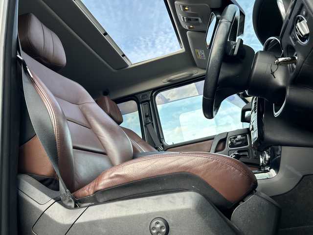 メルセデス・ベンツ ゲレンデヴァーゲン Ｇ３５０ｄ 広島県 2017(平29)年 6.2万km ポーラホワイト 4WD/ディーゼルターボ/サンルーフ/harman/kardonプレミアムサウンド/純正ナビ（フルセグTV/Bluetooth）/バックカメラ/ETC2.0/ブラウンレザーシート/・パワーシート（メモリー機能付き）/・シートヒーター/レーダークルーズコントロール/コーナーセンサー/LEDヘッドライト/オートライト/純正18インチAW/革巻きステアリング/純正フロアマット/スペアキー