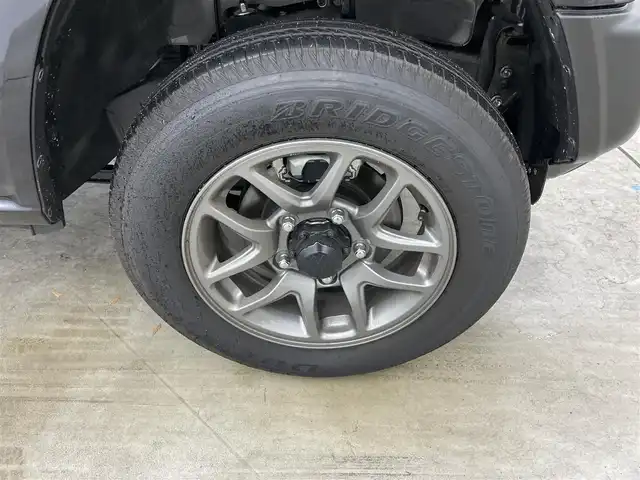 スズキ ジムニー XC 岡山県 2025(令7)年 0.2万km ブルーイッシュブラックパール3 クルーズコントロール　/ＬＥＤヘッドライト　/シートヒーター　/衝突軽減ブレーキ　/オートハイビーム　/オートライト　/フォグランプ　/純正１６インチアルミホイール　/社外フロアマット　/プッシュスタート　/スマートキー/アイドリングストップ/禁煙車/ダウンヒルアシスト