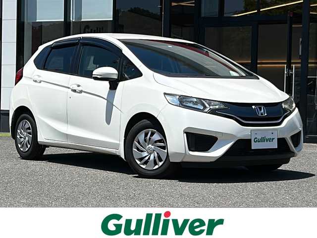 ホンダ フィット 13G Fパッケージ 大阪府 2014(平26)年 7.6万km プレミアムホワイトパール オーディオ　/マルチメディア　/CD/Gathers/AUX　/横滑り防止　/盗難防止　/スマートキー　/プッシュスタート　　/Wエアバッグ　/アイドリングストップ　/ABS　/保証書　/取扱説明書/アイドリングストップ/純正フロアマット