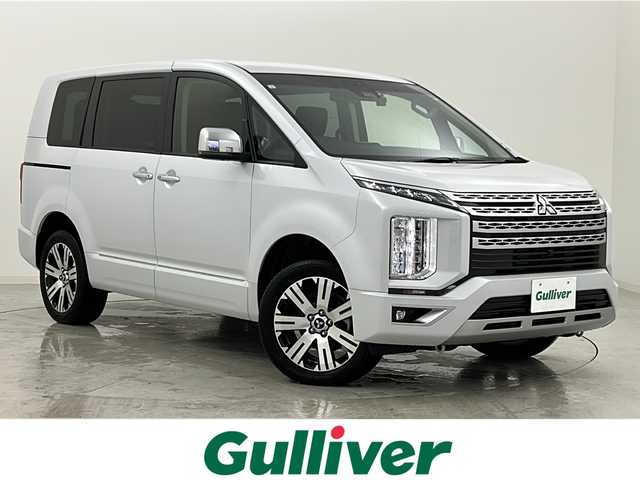 三菱 デリカＤ：５ P 宮城県 2024(令6)年 1.5万km ホワイトダイヤモンド 電動サイドステップ/4WD/e-Assist/・衝突被害軽減ブレーキシステム/・車線逸脱警報システム/・後側方車両検知警報システム/全方位カメラ/社外7インチSDナビ/・BT.CD.DVD.SD/両側パワースライドドア/電動リアゲート/D席パワーシート/前席シートヒーター/ステアリングヒーター/ステアリングスイッチ/パドルシフト/ETC/ドライブレコーダー（F）/プッシュスタート/スマートキー/LEDヘッドライト/LEDフォグライト/社外フロアマット/純正18AW