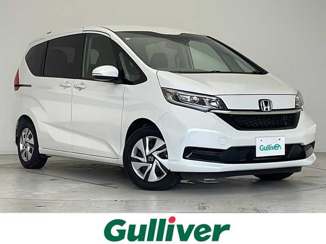 ホンダ フリード ハイブリット G 愛知県 2023(令5)年 1.9万km プラチナホワイトパール 衝突軽減システム/純正ナビ　ＳＤカードなし/両側パワースライドドア/クルーズコントロール/シートヒーター/フルセグ/CD DVD/Bluetooth/バックカメラ/コーナーセンサー/純正アルミホイール/LEDヘッドライト/オートライト/ドライブレコーダー/ETC/ステアリングスイッチ/スマートキー/プッシュスタート