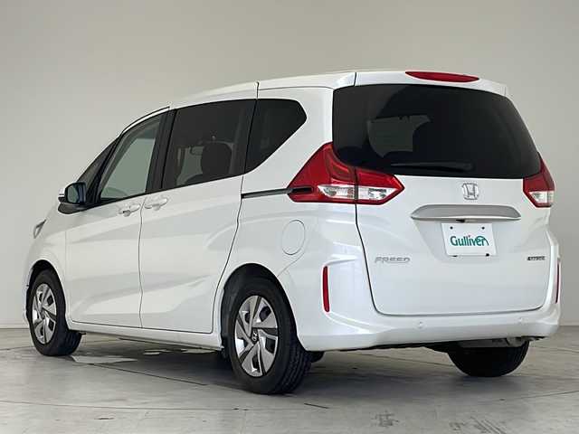 ホンダ フリード ハイブリット G 愛知県 2023(令5)年 1.9万km プラチナホワイトパール 衝突軽減システム/純正ナビ　ＳＤカードなし/両側パワースライドドア/クルーズコントロール/シートヒーター/フルセグ/CD DVD/Bluetooth/バックカメラ/コーナーセンサー/純正アルミホイール/LEDヘッドライト/オートライト/ドライブレコーダー/ETC/ステアリングスイッチ/スマートキー/プッシュスタート