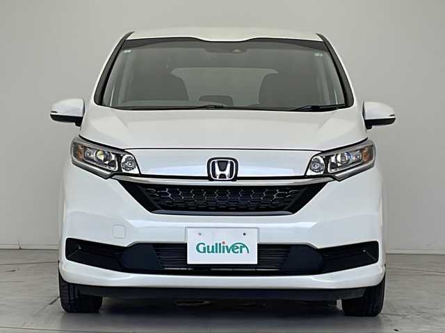 ホンダ フリード ハイブリット G 愛知県 2023(令5)年 1.9万km プラチナホワイトパール 衝突軽減システム/純正ナビ　ＳＤカードなし/両側パワースライドドア/クルーズコントロール/シートヒーター/フルセグ/CD DVD/Bluetooth/バックカメラ/コーナーセンサー/純正アルミホイール/LEDヘッドライト/オートライト/ドライブレコーダー/ETC/ステアリングスイッチ/スマートキー/プッシュスタート