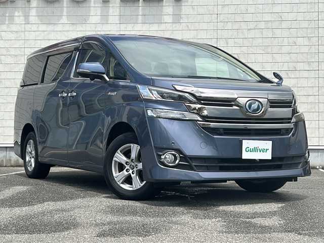 トヨタ ヴェルファイア ハイブリット X 富山県 2015(平27)年 9.8万km グレイッシュブルーマイカメタリック 〇純正ナビ/〇フルセグTV/〇Bluetooth/〇パノラミックビューモニター/〇ビルトインETC/〇ドライブレコーダー/〇パワースライドドア（両側）/〇クルーズコントロール/○コーナーセンサー/〇LEDヘッドランプ/〇オートライト/〇フォグランプ/〇純正16インチアルミ/〇革巻きステアリングホイール/〇前後左右独立オートエアコン/〇スマートエントリー/〇禁煙車