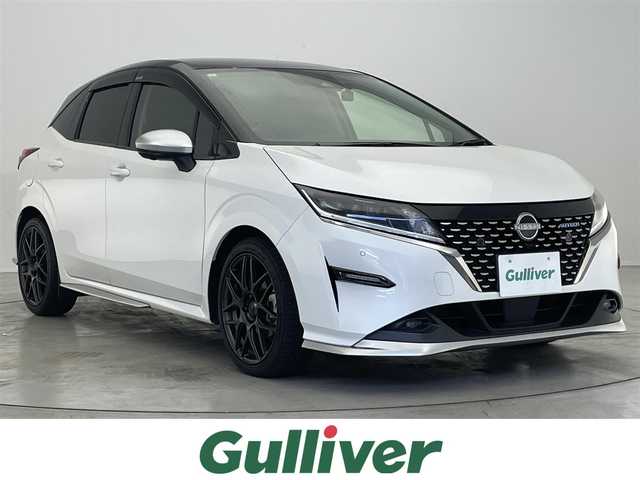 日産 ノート オーテック 滋賀県 2021(令3)年 3.3万km ピュアホワイトパール / スーパーブラック 2トーン プロパイロット/純正メーカー９型ナビ/・HDMI/Bluetooth/USB/AppleCarPlay/レザーシート/インテリジェントルームミラー/アラウンドビューモニター/LEDヘッドライト/社外１７AW（WedsSport）/おくだけ充電/BSM/革巻きステアリング/コーナーセンサー/追従クルーズコントロール/横滑り防止/衝突軽減ブレーキ/前後コーナーセンサー/ETC