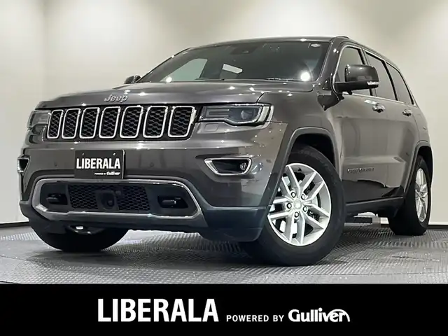 クライスラー・ジープ ジープ グランドチェロキー LTD 新潟県 2018(平30)年 2万km グレー 純正メモリナビ【BT/フルセグ】/バックカメラ/自動緊急ブレーキ/レーンセンス/フロント、リア　パークセンス縦列/並列/リアパークセンスブレーキアシスト/パドルシフト/ブラインドスポット警告/ヒルスタートアシスト/オートハイビーム/ヒーテッドシーチ【D/N】/ヒーテッドステアリング/ベンチレーションシート(D/N)/ETC2.0/革シート/走行モード切替/エアサスペンション/スポーツモード