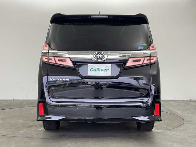トヨタ ヴェルファイア Z Gエディション 兵庫県 2018(平30)年 7.7万km ブラック ・社外10インチSDナビ（AVIC-CE902VE）/・CD/DVD/BT/SD/フルセグTV/・バックカメラ/・ビルトインETC/・前後ドライブレコーダー/・社外レーダー探知機/・後席モニター２個（carrozzeria)/・両側パワースライドドア/・Toyota　Safety　Sense/・プリクラッシュセーフティ/・レーントレーシングアシスト/・レーダークルーズコントロール/・ロードサインアシスト/・オートマチックハイビームシステム/・クリアランスソナー/・パーキングサポートブレーキ/・デジタルインナーミラー/・ブラインドスポットモニター/・パワーバックドア/・合成皮革シート/・運転席メモリーシート/・前席パワーシート/・前席シートヒーター/・前席ベンチレーション/・ステアリングヒーター/・純正１８インチアルミホイール/・AC100V電源/・3眼LEDオートライト/・LEDフォグランプ/・社外フロアマット（後席部無し）/・シーケンシャルウィンカー/・スマートキー/・スペアキー/・プッシュスタート