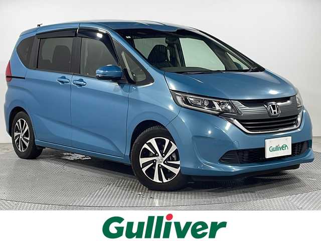 ホンダ フリード G 広島県 2018(平30)年 3.4万km ブルーホライゾンM 純正ナビ（フルセグTV/Bluetooth/DVD）/バックカメラ/片側パワースライドドア/LEDヘッドランプ/オートライト/ハーフレザーシート/純正15インチAW/ビルトインETC/ステアリングスイッチ/スマートキー