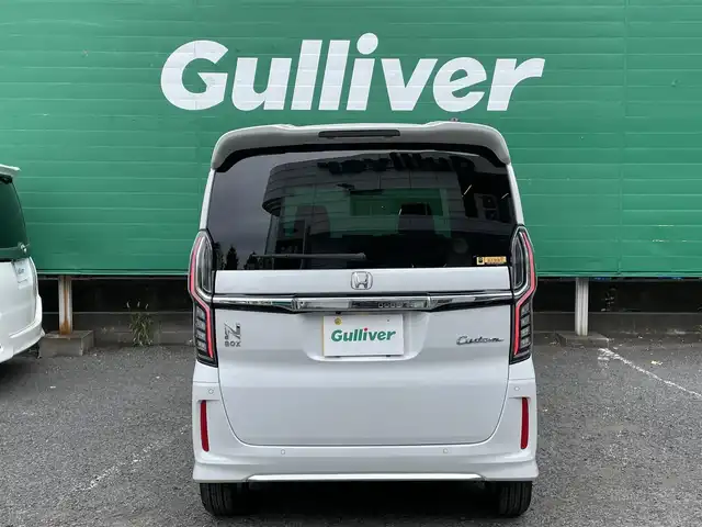 ホンダ Ｎ ＢＯＸ カスタム L ターボ 東京都 2023(令5)年 0.7万km プラチナホワイトパール ターボ/ワンオーナー/純正SDナビ【VXM-234VFi】/（CD/DVD/BTオーディオ/フルセグ）/バックカメラ/ホンダセンシング/・アダクティブクルーズコントロール/・路外逸脱抑制機能/・衝突軽減ブレーキ/・標識認識機能/両側パワースライドドア/ハーフレザーシート/前席シートヒーター/純正フロアマット/前後ドライブレコーダー【DBH-224SD】/ETC/スペアキー×1/取扱説明書/保証書