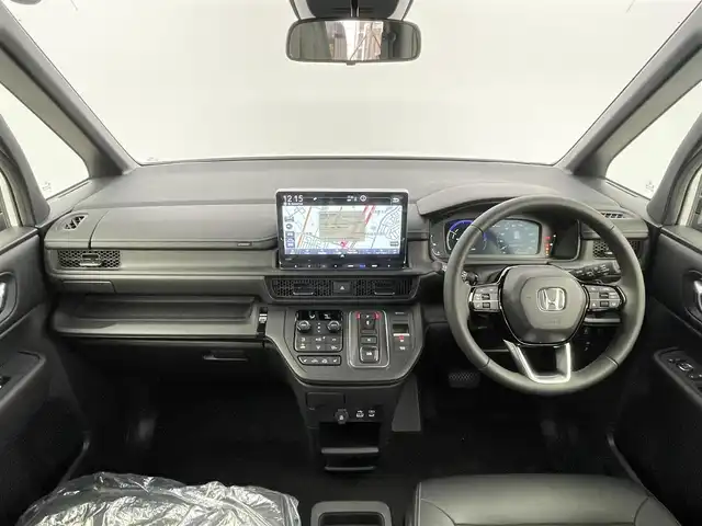 ホンダ ステップワゴン スパーダ eHEV 千葉県 2025(令7)年 0.1千km プラチナホワイトパール 登録済未使用車/純正11.4インチナビ/・LXM-247VFLi/・CD/DVD/BT/ACP/AA/フルセグ/Honda SENSING/・衝突軽減ブレーキ（CMBS）/・先行車発進お知らせ機能/・歩行者事故低減ステアリング/・路外逸脱抑制機能●標識認識機能/・渋滞追従機能付アダプティブクルーズコントロール（ACC）/・車線維持支援システム（LKAS）/・トラフィックジャムアシスト（渋滞運転支援機能）/・ブラインドスポットインフォメーション/・誤発進抑制機能/・後方誤発進抑制機能/・近距離衝突軽減ブレーキ/・急アクセル抑制機能/・パーキングセンサーシステム/・オートハイビーム/ブラインドスポットインフォメーション/両側パワースライドドア/パワーテールゲート(メモリー機能付)/バックカメラ/ハーフレザーシート/前席シートヒーター/LEDヘッドライト/パドルシフト/スマートキー/スペアキー/純正16インチアルミホイール