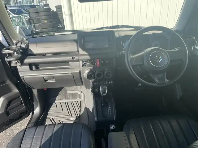 スズキ ジムニー XL 富山県 2024(令6)年 3.3万km ブルーイッシュブラックパール3 革調シートカバー/社外７インチナビ／/フルセグＴＶ／/Ｂｌｕｅｔｏｏｔｈ／/ＤＶＤ再生／/リフトアップサスペンション／/社外マフラー／/ＥＴＣ／/シートヒーター／/スマートキー／/プッシュスタート／/室内ルーフキャリア