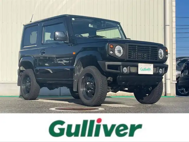 スズキ ジムニー XL 富山県 2024(令6)年 3.3万km ブルーイッシュブラックパール3 革調シートカバー/社外７インチナビ／/フルセグＴＶ／/Ｂｌｕｅｔｏｏｔｈ／/ＤＶＤ再生／/リフトアップサスペンション／/社外マフラー／/ＥＴＣ／/シートヒーター／/スマートキー／/プッシュスタート／/室内ルーフキャリア
