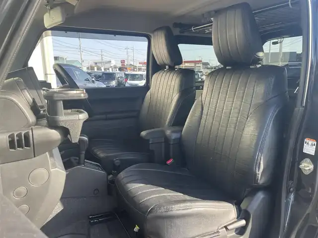 スズキ ジムニー XL 富山県 2024(令6)年 3.3万km ブルーイッシュブラックパール3 革調シートカバー/社外７インチナビ／/フルセグＴＶ／/Ｂｌｕｅｔｏｏｔｈ／/ＤＶＤ再生／/リフトアップサスペンション／/社外マフラー／/ＥＴＣ／/シートヒーター／/スマートキー／/プッシュスタート／/室内ルーフキャリア