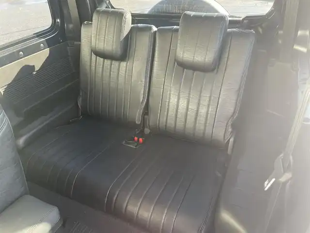 スズキ ジムニー XL 富山県 2024(令6)年 3.3万km ブルーイッシュブラックパール3 革調シートカバー/社外７インチナビ／/フルセグＴＶ／/Ｂｌｕｅｔｏｏｔｈ／/ＤＶＤ再生／/リフトアップサスペンション／/社外マフラー／/ＥＴＣ／/シートヒーター／/スマートキー／/プッシュスタート／/室内ルーフキャリア