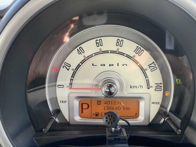 スズキ ラパン X 三重県 2009(平21)年 13.9万km ミルクティーベージュメタリック 社外ナビ/フルセグTV/バックカメラ/HIDヘッドライト/プッシュスタート/スマートキー/純正フロアマット/ドアバイザー/電動格納ミラー/ヘッドライトレベライザー/Wエアバック