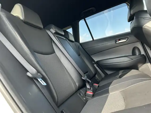 トヨタ カローラ クロス ハイブリッド Z 広島県 2022(令4)年 1.8万km プラチナホワイトパールマイカ モデリスタ18インチAW/モデリスタエアロ　/純正９インチディスプレイオーディオ　/ 「ナビ/Bluetooth/フルセグ/CD/DVD」/全方位カメラ　/ブラインドスポットモニター/レーダークルーズコントロール　/クリアランスソナー　/電動リアゲート　/前席シートヒーター/D席パワーシート/ビルトインＥＴＣ/前後ドライブレコーダー/衝突軽減ブレーキシステム/車線逸脱防止システム/オートハイビーム/LEDヘッドライト（AUTO機能付き）/ヘッドライトレベライザー/スマートキー/プッシュスタート