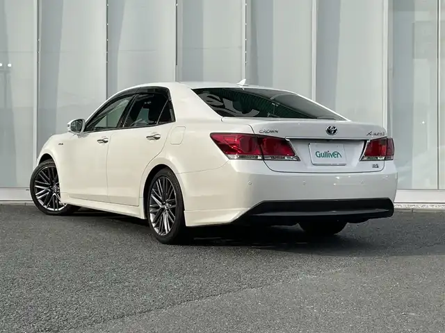 トヨタ クラウン ハイブリッド アスリートG 福岡県 2014(平26)年 10.6万km ホワイトパールクリスタルシャイン 純正ナビ/（AM/FM/CD/DVD/HDD/USB/BT/ワンセグ）/レーダークルーズコントロール/前後コーナーセンサー/ワンオーナー/社外アルミホイール付きスタッドレスタイヤ4本（215/55/17）/ETC/バックカメラ/前方ドライブレコーダー/レザーシート/D+N席パワーシート/D+N席シートヒーター/D+N席エアシート/D席メモリーシート/純正18インチアルミホイール/オートライト/フォグランプ/オートハイビーム/フロアマット/MT付きAT/ステアリングスイッチ/純正ドアバイザー/オート電動格納ミラー/スマートキー/プッシュスタート/リアサンシェード/W+カーテンエアバッグ/DUALオートエアコン/ISO FIX