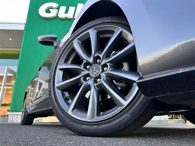 マツダ マツダ３ファストバック XD バーガンディセレクション 宮城県 2019(令1)年 7.9万km マシーングレープレミアムM 360度セーフティパッケージ/・360度ビューモニター/・ドライバーモニタリング/＝＝＝/スマートブレーキサポート/AT誤発進抑制制御/全車速追従機能付クルーズコントロール/クルージングトラフィックサポート/車線逸脱警報システム/レーンキープアシスト/前後即雹接近車両検知/ブラインドスポットモニタリング/パーキングセンサー/ドライバーアテンションアラート/ヘッドアップディスプレイ/マツダコネクト8.8インチディスプレイナビSDカード無/・CD/DVD/・Bluetooth/・HDMI/・フルセグTV/ビルトインETC/ドライブレコーダー/レザーシート/シートヒーター/ステアリングヒーター/メモリー機能付パワーシート/アダプティブLEDヘッドライト/オートライト/電動パーキングブレーキ/ブレーキホールド/スマートキー＆プッシュスタート/スペアキー2本/電動格納ミラー/純正18インチAW/フロアマット/ドアバイザー/W/サイド/カーテンエアバッグ