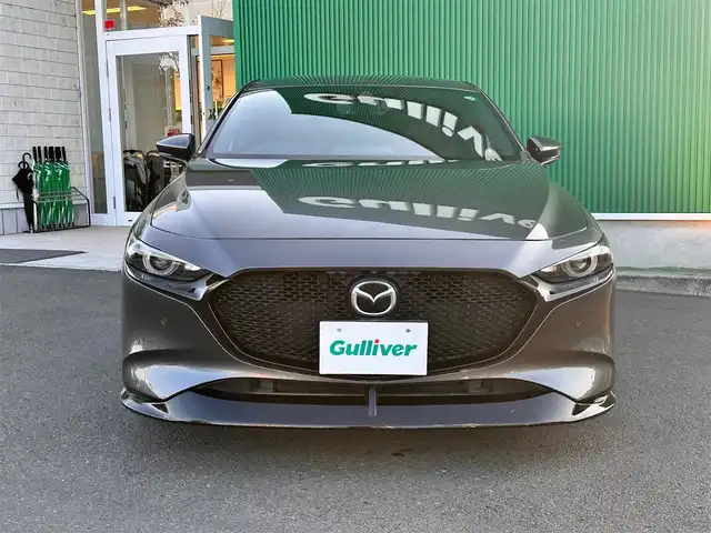 マツダ マツダ３ファストバック XD バーガンディセレクション 宮城県 2019(令1)年 7.9万km マシーングレープレミアムM 360度セーフティパッケージ/・360度ビューモニター/・ドライバーモニタリング/＝＝＝/スマートブレーキサポート/AT誤発進抑制制御/全車速追従機能付クルーズコントロール/クルージングトラフィックサポート/車線逸脱警報システム/レーンキープアシスト/前後即雹接近車両検知/ブラインドスポットモニタリング/パーキングセンサー/ドライバーアテンションアラート/ヘッドアップディスプレイ/マツダコネクト8.8インチディスプレイナビSDカード無/・CD/DVD/・Bluetooth/・HDMI/・フルセグTV/ビルトインETC/ドライブレコーダー/レザーシート/シートヒーター/ステアリングヒーター/メモリー機能付パワーシート/アダプティブLEDヘッドライト/オートライト/電動パーキングブレーキ/ブレーキホールド/スマートキー＆プッシュスタート/スペアキー2本/電動格納ミラー/純正18インチAW/フロアマット/ドアバイザー/W/サイド/カーテンエアバッグ